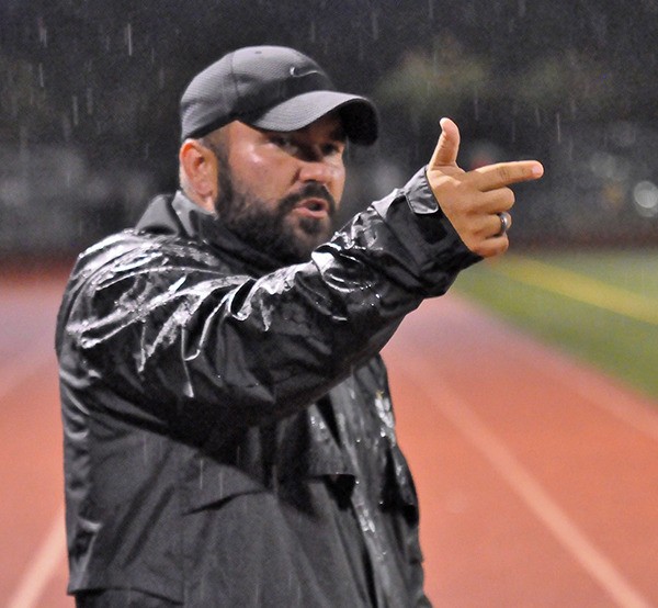 Auburn coach Chance Darling directs his team from the sidelines.