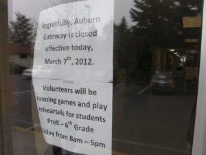 Signs notify parents that Auburn's Gateway School has closed.