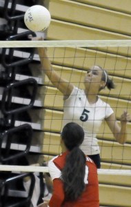 Auburn Riverside’s Brooke Bray returns the ball during recent action this season. The talented and versatile Bray
