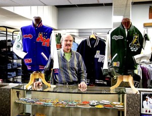 John Rottle mans the letterman jacket counter at Rottles Apparel and Shoes in downtown Auburn.