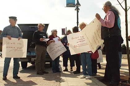 Supporters of a living wage gathered in Auburn on Tuesday as part of a push to raise the federal minimum wage.