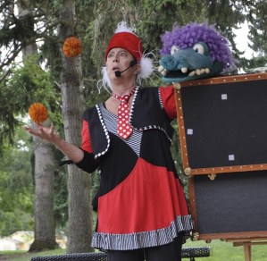 Linda Severt juggles with her alligator