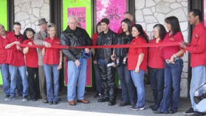 Auburn Mayor Pete Lewis joined Eagle Leather owner Mike Toursal