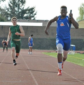 Auburn Mountainview's Gavin Robertson finishes the 400-meter relay