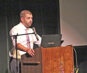 Jason Ankerfelt talks at his wife