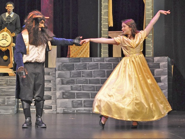 Christian Loomis plays the Beast and Jessica Alley is Belle in the Auburn Actors' Guild presentation of “Beauty and the Beast”.