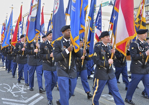 Members of a U.S. Army honor color guard march in Auburn’s Veterans Day Parade last year.