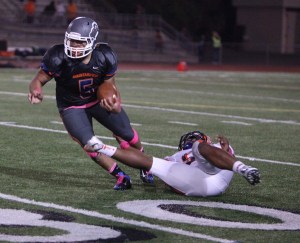 Running back Bitner Wilson escapes a Lakes defender.