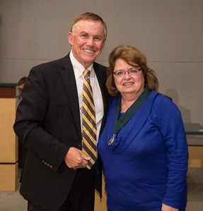King County Councilmember Pete von Reichbauer presents Debbie Christian of Auburn with the first annual MLK Medal of Distinguished Service Award recognizing her positive impact on the community through service.