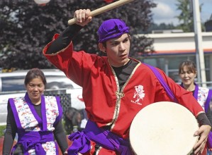 Members of the Okinawa Kenjin-Kai Eisa Taiko group perform during the Bon Odori Festival at the White River Buddhist Temple on Saturday.