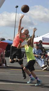 Ana Hetty goes up for a shot during play last year in the hoops showdown at Emerald Downs. Thirty-one outdoor courts will entertain games in the Jim Marsh Classic this weekend.