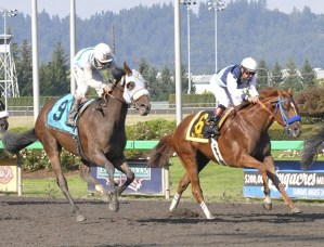 2014 Horse of the Meeting Stryker Phd D (9) strides to victory in the Longacres Mile. The Grade 3 race returns to Emerald Downs on Aug. 16