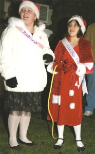 Samantha Curtin and Katrina Williams flip the switch to light up the City of Pacific Christmas Tree last Friday night. Pacific Partnerships hosted the second annual tree lighting ceremony at the Pacific City Hall lawn
