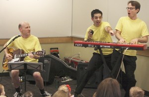 Caspar Babypants and friends entertain a packed house at the Auburn Public Library last year. From left are: vocalist and guitarist Chris Ballew
