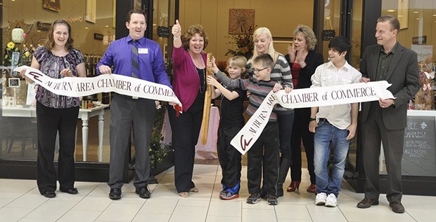 At the ribbon-cutting ceremony are