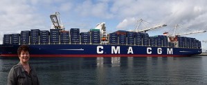 Sen. Pam Roach watches the largest cargo ship ever to visit the United States