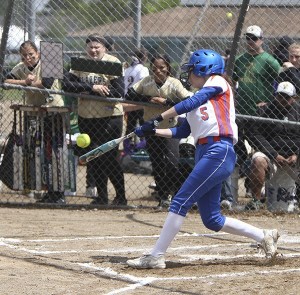Auburn Mountainview's Cassie Hunt connects during the Lions' district game against Timberline.