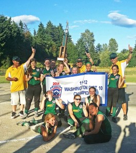 Aubur Little League's Team Xtreme U12 softball team celebrates their District 10 title.