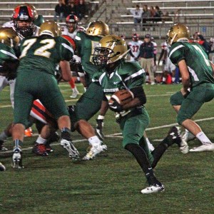 Masai Matthews scampers for a gain against Lakes.