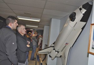 The public takes in a display of the Space Shuttle Challenger at an open house at Dick Scobee Elementary on Thursday night. The event commemorated the 30th anniversary of the Challenger disaster and the loss of its crew