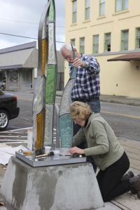 Lin Rebolini McJunkin installs her sculpture 'Riparian Totem