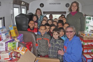 Joining the class on the bus is Debbie Christian