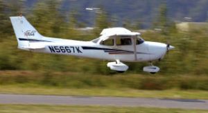 A small plane prepares to land at Auburn Municipal Airport. The state’s fourth busiest commuter airport is in line for some improvements.