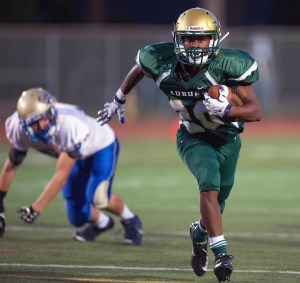 Auburn’s Nathaniel Johnson scoots into the open field during the Trojan’s win against Tahoma. COURTESY PHOTO