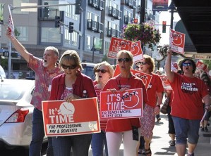 Seen and heard: Auburn teachers take their plea to the downtown streets.