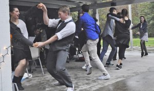 Members of Pacific Ballroom Dance Academy move to the music on stage during the S’more Than You Imagine event at Game Farm Wilderness Park last Saturday. RACHEL CIAMPI