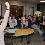 Auburn School District superintendent Alan Spicciati and other supporters celebrate early returns Tuesday night for King and Pierce counties. Between the counties, the capital facilities bond was passing with 60.2 percent of 19,518 ballots cast to rebuild six schools and construct two new ones. RACHEL CIAMPI, Auburn Reporter
