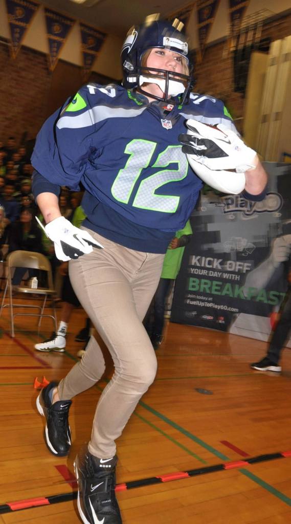 Teacher Joette Dunnihoo does a Play 60 activity. RACHEL CIAMPI, Auburn Reporter