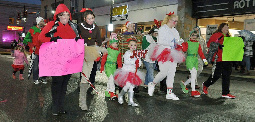 Local Girl Scouts and their leaders march down Main Street. RACHEL CIAMPI, Reporter