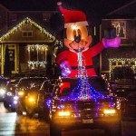 Residents drove cars decorated in Christmas lights and went through the neighborhood gathering donations. COURTESY PHOTO