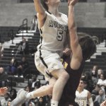Auburn&rsquo;s Zane Harshman drives to the lane during Tuesday&rsquo;s loss to Enumclaw. Rachel Ciampi, Auburn Reporter