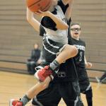 Carter Hansen of the fourth-grade ABA Green team drives to the basket against Sumner during Auburn Select Youth Basketball play at Olympic Middle School last Saturday. Teams of third- and fourth graders converged at the gym for action throughout the day. To learn more about the program, visit auburnhoops.com. RACHEL CIAMPI, Auburn Reporter