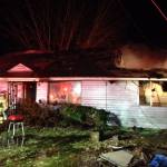 VRFA firefighters quickly put out a chimney fire that reached the attic and partially collapsed a roof to an Algona home in the 100 block of Fifth Avenue North late Wednesday night. COURTESY PHOTO, VRFA