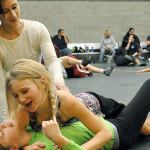 Muscle tussle: local girls get a grip on wrestling at camp