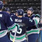 The Thunderbirds celebrate Austin Strand&rsquo;s game-winning goal in overtime against the Chiefs on Tuesday night. COURTESY PHOTO, Larry Brunt