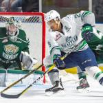 The Thunderbirds&rsquo; Keegan Kolesar tries to position himself for a shot in front of Silvertips goalie Carter Hart during WHL play Tuesday night at the ShoWare Center. COURTESY PHOTO, Brian Liesse/T-Birds