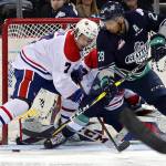The Thunderbirds&rsquo; Keegan Kolesar tangles with the Chiefs&rsquo; Nolan Reid for control of the puck in front of the Spokane net during WHL play Sunday evening. COURTESY PHOTO, Larry Brunt