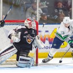 The Thunderbirds&rsquo; Mathew Barzal looks to fire a shot at Giants goalie David Tendeck during WHL play Saturday night at the ShoWare Center. COURTESY PHOTO, Brian Liesse/T-Birds