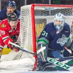 The Winterhawks&rsquo; Colton Veloso tries to wrap around a shot at the Thunderbirds&rsquo; Rylan Toth during WHL play Saturday night at the ShoWare Center. COURTESY PHOTO, Brian Liesse, T-Birds