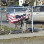 Auburn VFW Post 1741 recently came to the rescue of this tattered and worn flag in southeast Auburn. COURTESY PHOTO