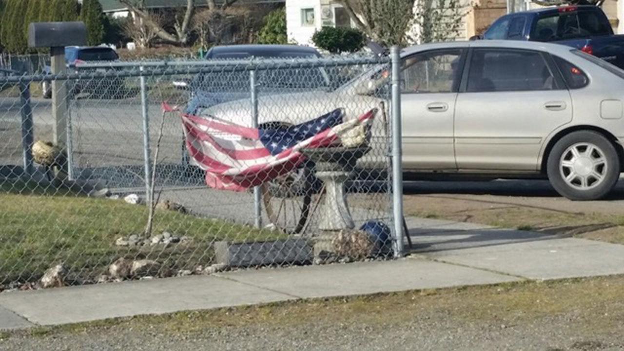 Auburn VFW Post 1741 recently came to the rescue of this tattered and worn flag in southeast Auburn. COURTESY PHOTO
