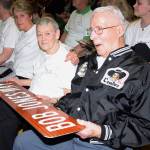 Bob Jones&rsquo; parents, Doris and Carl Jones, hold the new street sign during the ceremony. RACHEL CIAMPI, Reporter