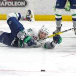 The Thunderbirds&rsquo; Nolan Volcan watches as he pushes the puck up the ice during playoff action against the Americans on Saturday night. COURTESY PHOTO, Brian Liesse/T-Birds