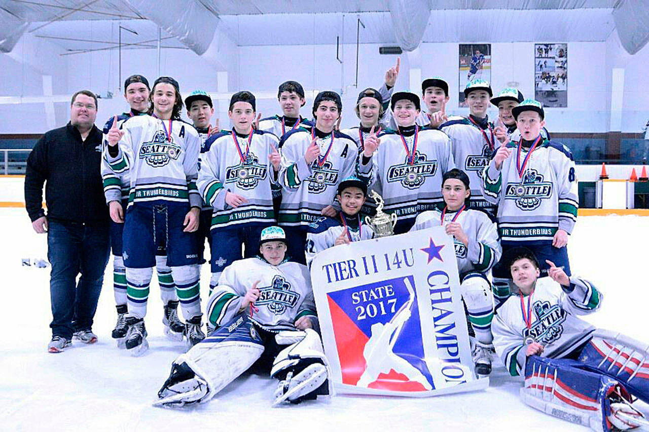 Best on ice: The Sno-King Amateur Hockey Association&rsquo;s 14U Junior Thunderbirds celebrate after taking the Washington state championship in Spokane on March 19. COURTESY PHOTO