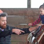 Kids play with ponies during Western Days at Reber Ranch