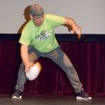 Lea Hill Elementary School P.E. teacher Ty Podeszwa does a touchdown dance on stage during a Fuel Up to Play 60 (FUTP60) rally Tuesday morning at the Performing Arts Center. RACHEL CIAMPI, Auburn Reporter